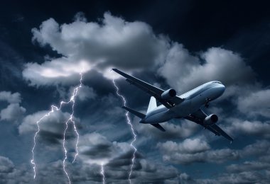Passenger aeroplane yielding thunderstorm clipart