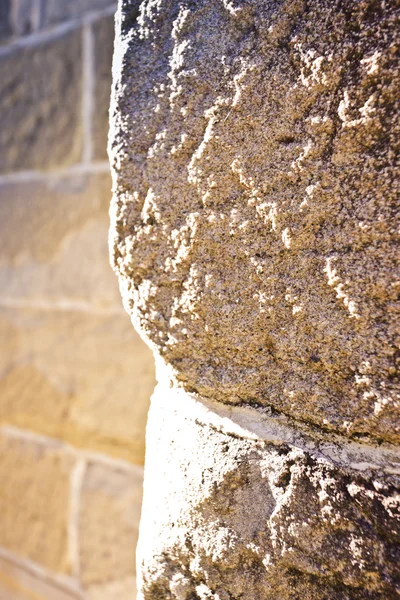 Steinmauer Nahaufnahme Details und verschwommener Hintergrund — Stockfoto