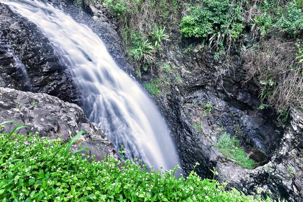Waterfall like a white smoke falling down on the rock — Stock Photo, Image