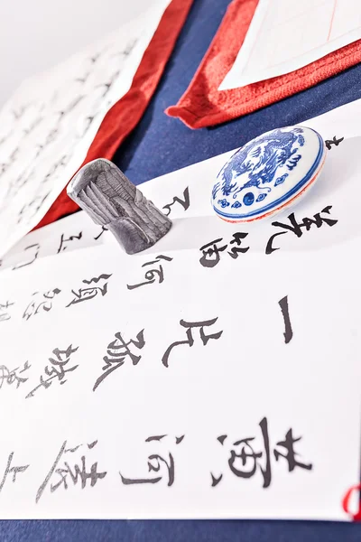 Letters drawn on a white paper on the table — Stock Photo, Image