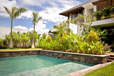 Modern bir köşkün Yüzme havuzlu Bahçe 