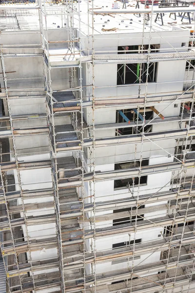 Budova ve výstavbě lešení zavřít nahoru — Stock fotografie