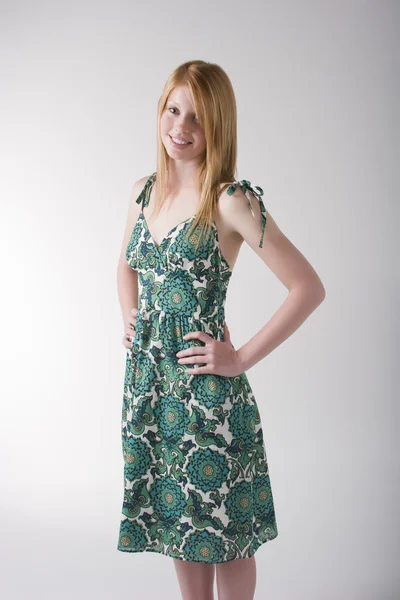 Redhead model in  green dress — Stock Photo, Image