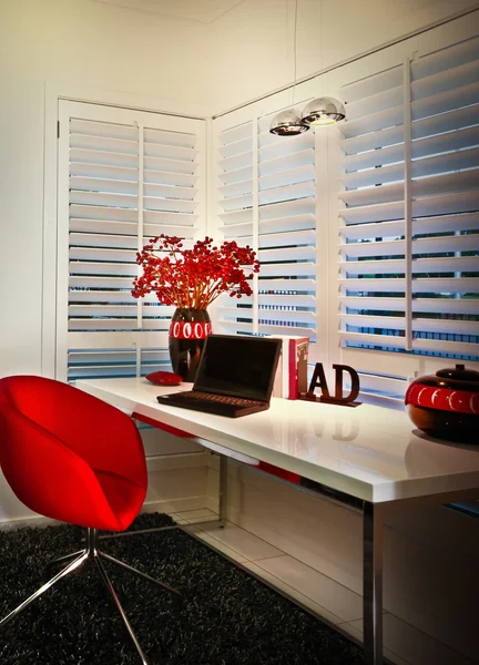 A study room with window and a laptop placed on a table — Stock Photo, Image