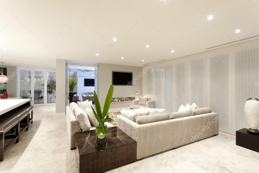 Spacious living room with grey sofas