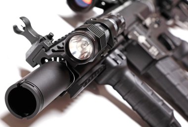 Part of AR-15 carbine with tactical flashlight clipart