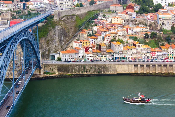 Ancient city Porto,metallic Dom Luis bridge, Douro river, boat — Stock Photo, Image