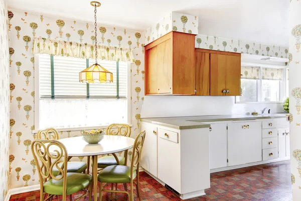 Dining area with table chair set connected with kitchen room — Stock Photo, Image