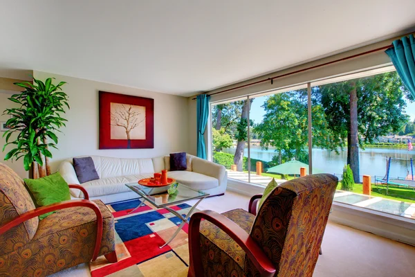 Classic red and blue living room interior with comfortable furniture set and large window. — Stock Photo, Image