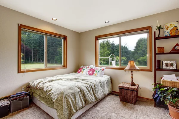 Nice bedroom interior  with carpet floor and two windows. — Stock Photo, Image