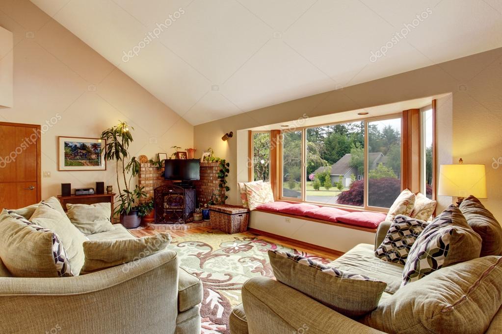 Living Room Interior With Vaulted Ceiling And Cozy Sitting