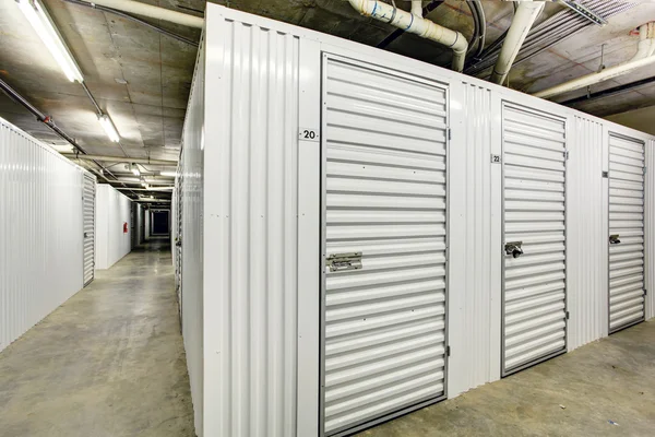 Storage units in the basement for apartment building — Stock Photo, Image