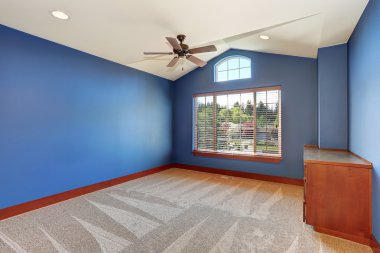Blue empty room interior with vaulted ceiling and carpet floor. clipart