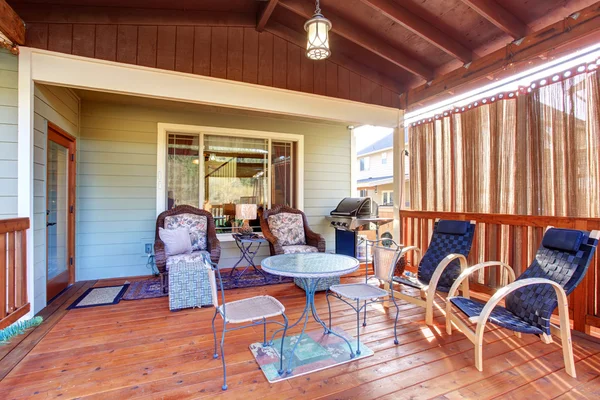 Exterior covered patio with furniture. — Stock Photo, Image