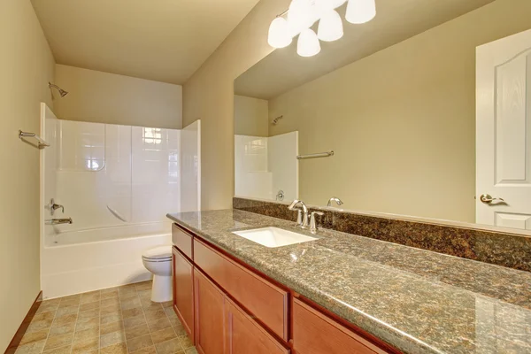 Bathroom interior with vanity cabinet, granite counter top — Stock Photo, Image