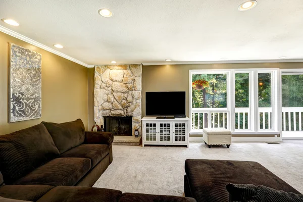 American family room interior with brown velvet sofa set. — Stock Photo, Image