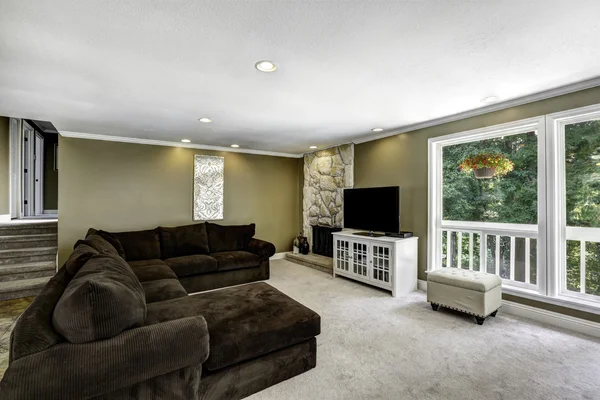 American family room interior with brown velvet sofa set. — Stock Photo, Image