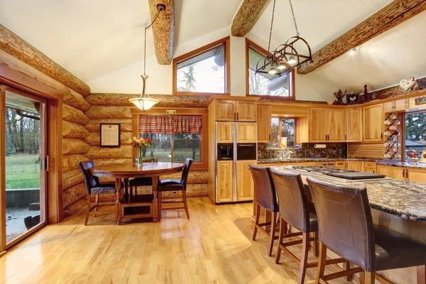 Log cabin house interior of dining and kitchen room — Stock Photo, Image