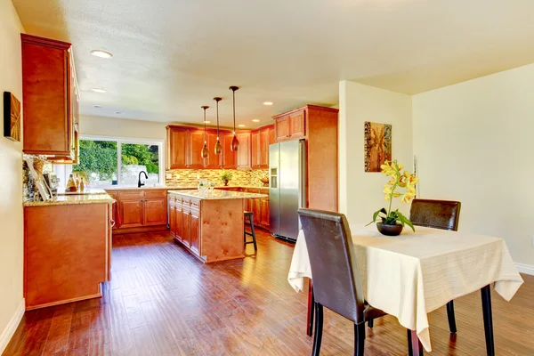 Practical kitchen with storage combination and granite tops. — Stock Photo, Image