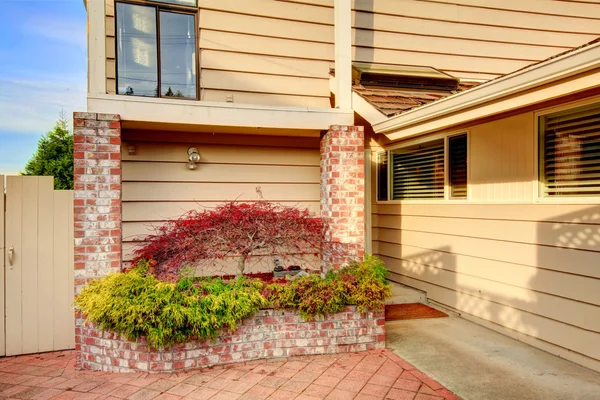 Close-up of garden bed with brick trim. — Stock Photo, Image