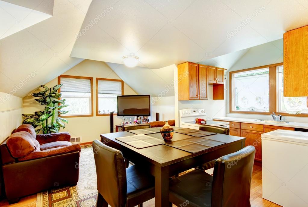 Dining And Kitchen Room Interior With White Vaulted Ceiling