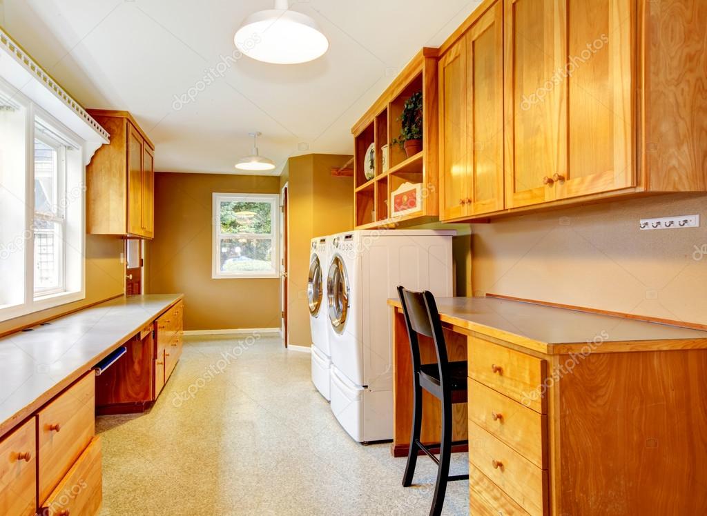 Spacious Laundry Room At The Horse Ranch Stock Photo Iriana88w Spacious Laundry Room At The Horse Ranch Furnished With Storage Combination And Desk Black Chair Photo By Iriana88w
