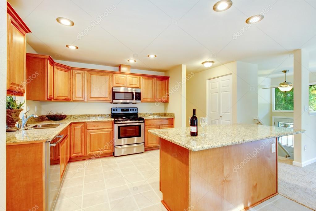 Bright Kitchen Room With Light Brown Cabinets And Steel Appliances Bright Kitchen Room With Light Brown Cabinets Granite Counter Tops And Steel Appliances Northwest Usa Photo By Iriana88w