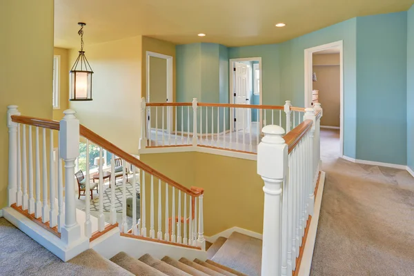 Hallway interior with blue and yellow walls — Stock Photo, Image