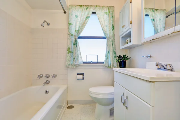 Old style bathroom interior  with white cabinets — Stock Photo, Image