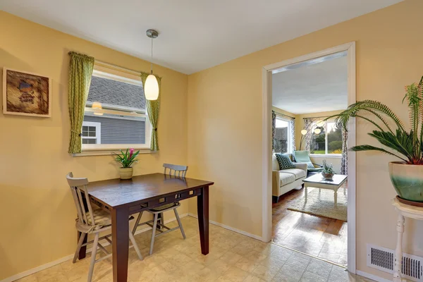 Dining area with table set and nice green curtains. — Stock Photo, Image