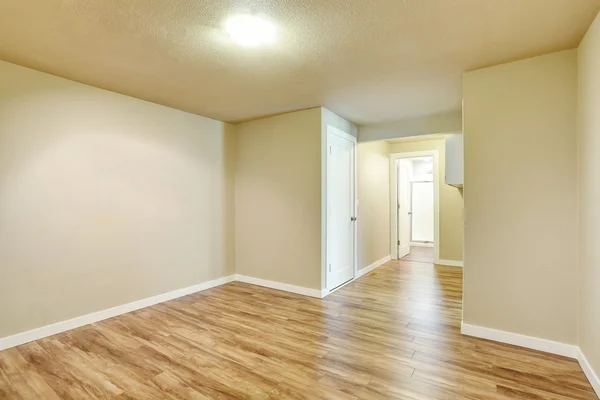 Hallway interior in light tones walls and hardwood floor. — Stock Photo, Image