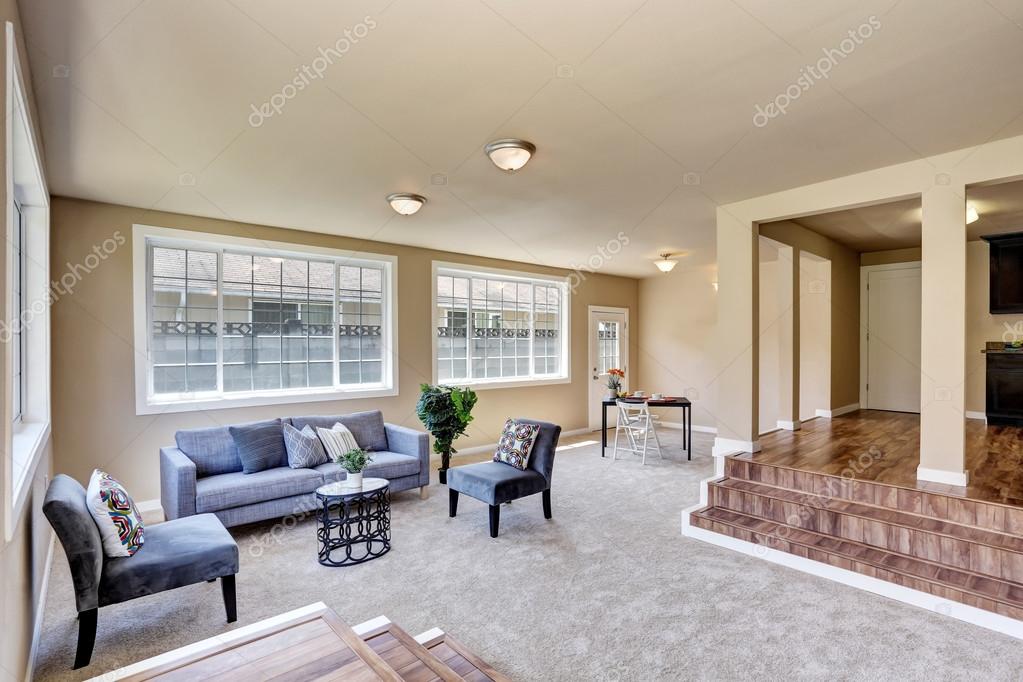 Hallway Interior In Beige Walls Living Room With Modern Blue Sofa Hallway Interior In Beige Walls Living Room With Modern Blue Sofa Stock Photo