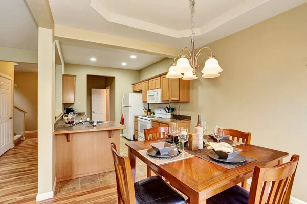 Dining area connected to kitchen room interior. Open floor plan