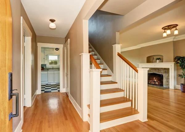 Hallway interior. View of living room with fireplace and kitchen room. — Stock Photo, Image