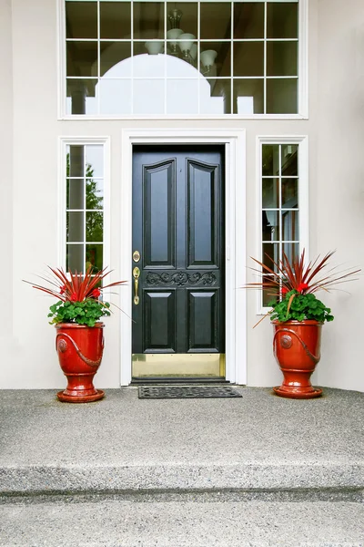 Luxury house entry way exterior with concrete floor porch. — Stock Photo, Image