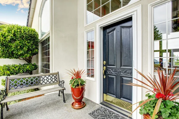 Luxury house entry way exterior with concrete floor porch. — Stock Photo, Image