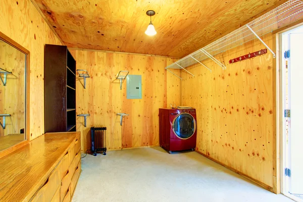 Simple laundry room with wooden trim in old farm house — Stock Photo, Image