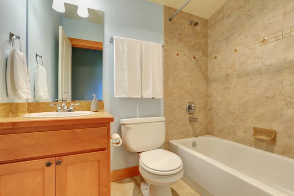 Bathroom interior with marble tile wall trim — Stock Photo, Image