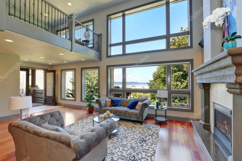 Grey Interior Of High Vaulted Ceiling Family Room Stock