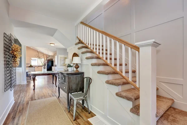 Nicely furnished hallway interior with vintage cabinet