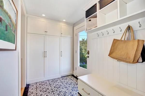 White hallway interior.  Storage cabinet with hangers — 스톡 사진