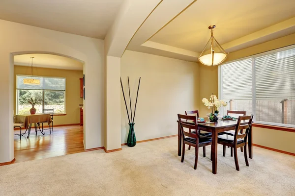 Open floor plan Dining room interior in creamy tones. — Stock Photo, Image