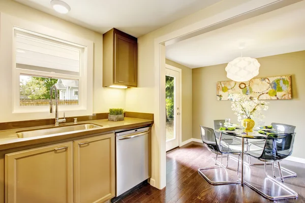 Kitchen room interior in beige tones with hardwood floor — Stock Photo, Image