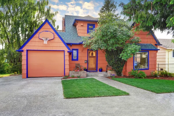 Coral exterior American house with blue trim with garage. — Stock Photo, Image