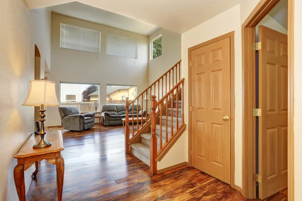 Classic hallway interior with hardwood floor. View of stairs to second floor — Stock Photo, Image