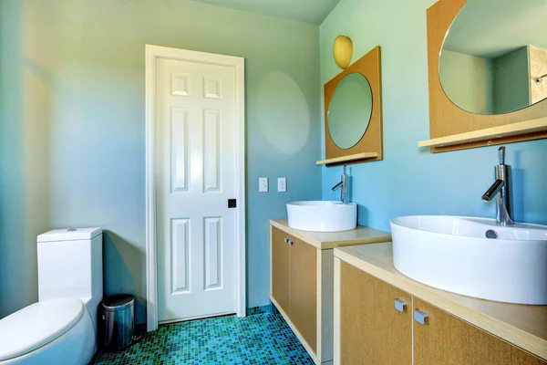 Bathroom vanity cabinets with vessel sinks and round mirrors — Stock Photo, Image