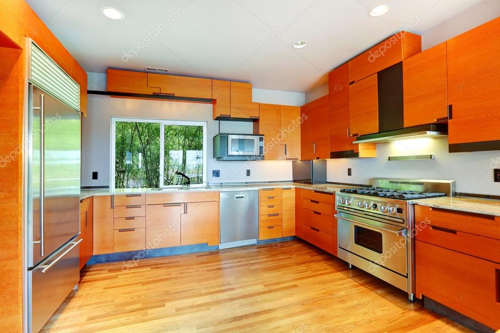 Modern bright orange kitchen room Stock Photo by ©iriana88w 52125527