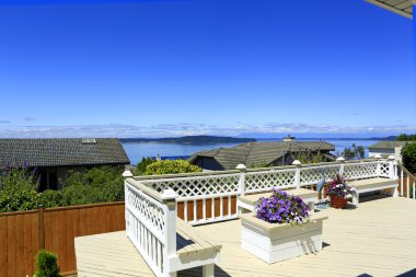 Beautiful deck with scenic bay view clipart