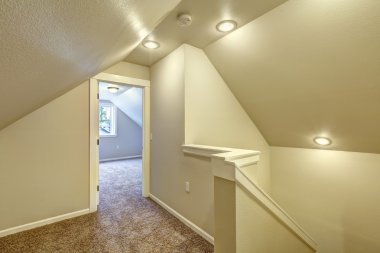 Upstairs hallway with vaulted ceiling clipart