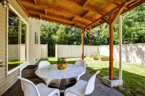 Patio area with white table set — Stock Photo, Image